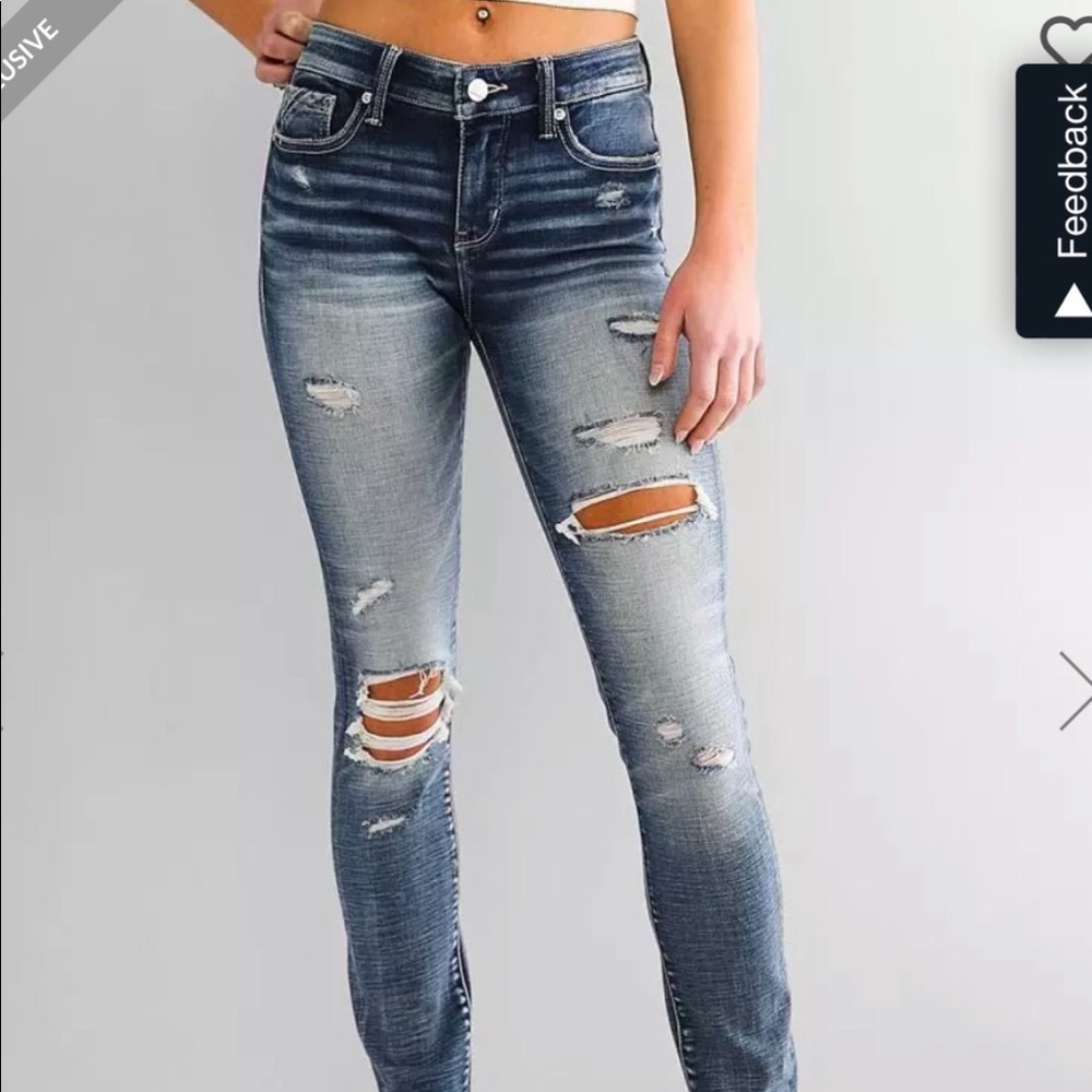 Buckle Black Jeans skinny form fitting. Superior Stretch. These jeans look great